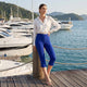 Hohe Taillen-Stretch-Cropped-Culottes mit seitlichen Knopfdetails