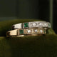 Ring made of gold and silver with green zirconia
