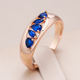 Ring with blue zirconium as inlay in gold
