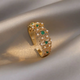 Elegant Ring with Pearls and Green Zircons