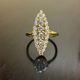 Gold-glimmering oval ring in vintage style