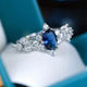 Silver-plated ring with oval blue crystal