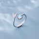 Adjustable Ring with Dolphin Tail in Sterling Silver and Blue Zirconia