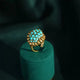 Golden Ring with Inlaid Blue Stones