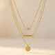Gold Tone Layered Necklace With Round Pendant