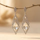 Sparkling Drop Earrings With Inlaid Stones